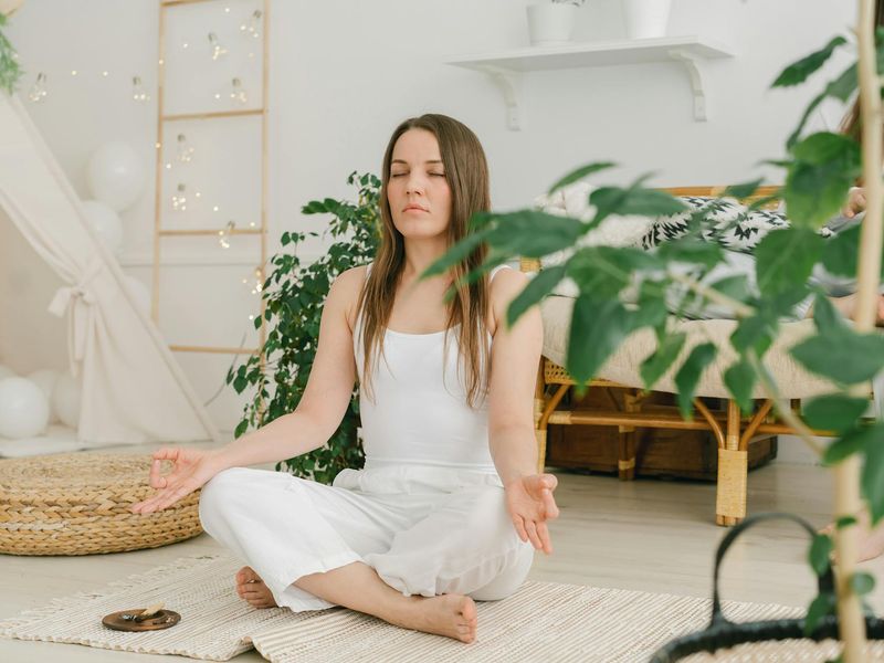 Main image of a person in a deep, calm yoga pose.